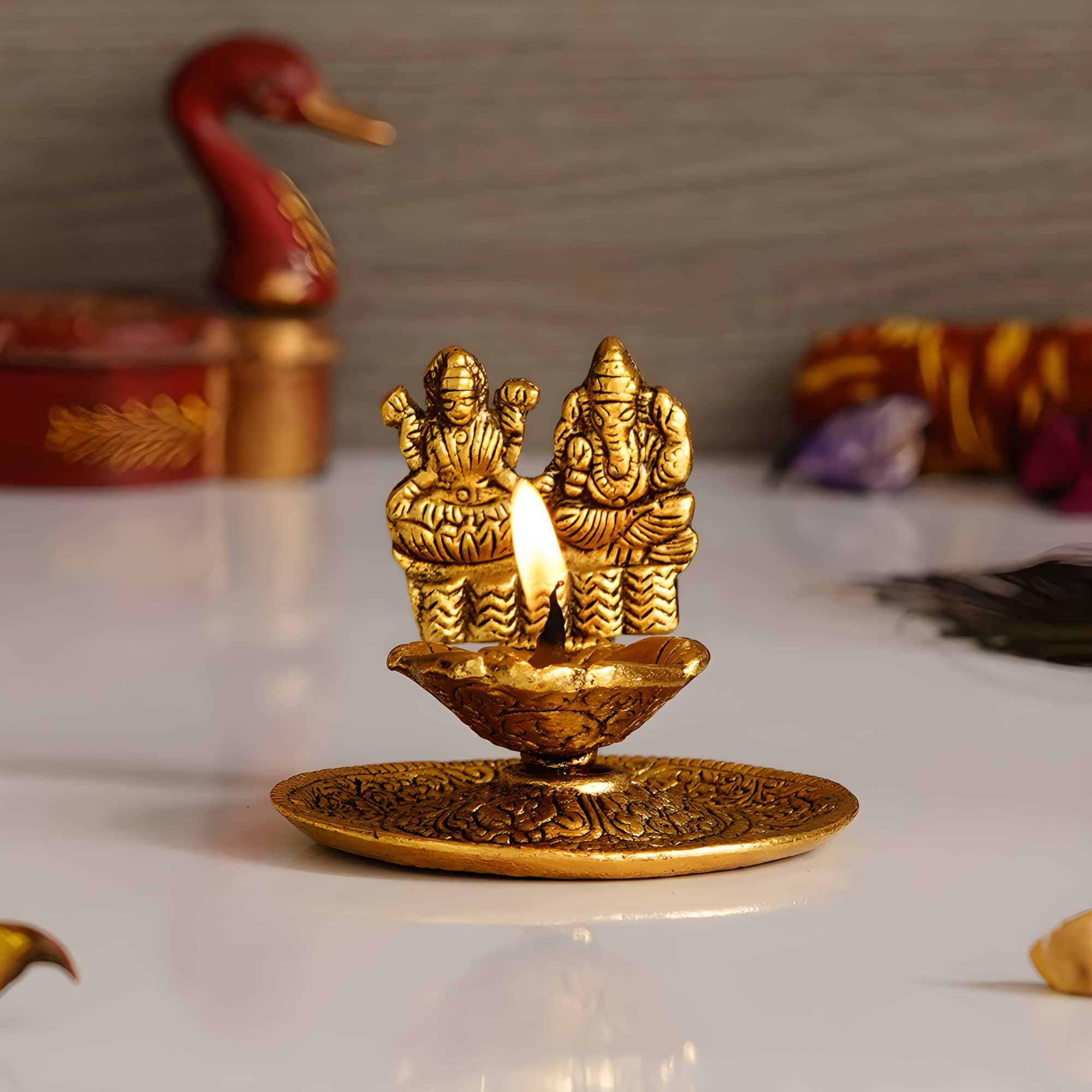 eCraftIndia Goddess Laxmi & Lord Ganesha Golden Metal Diya - KalaKirtiHub